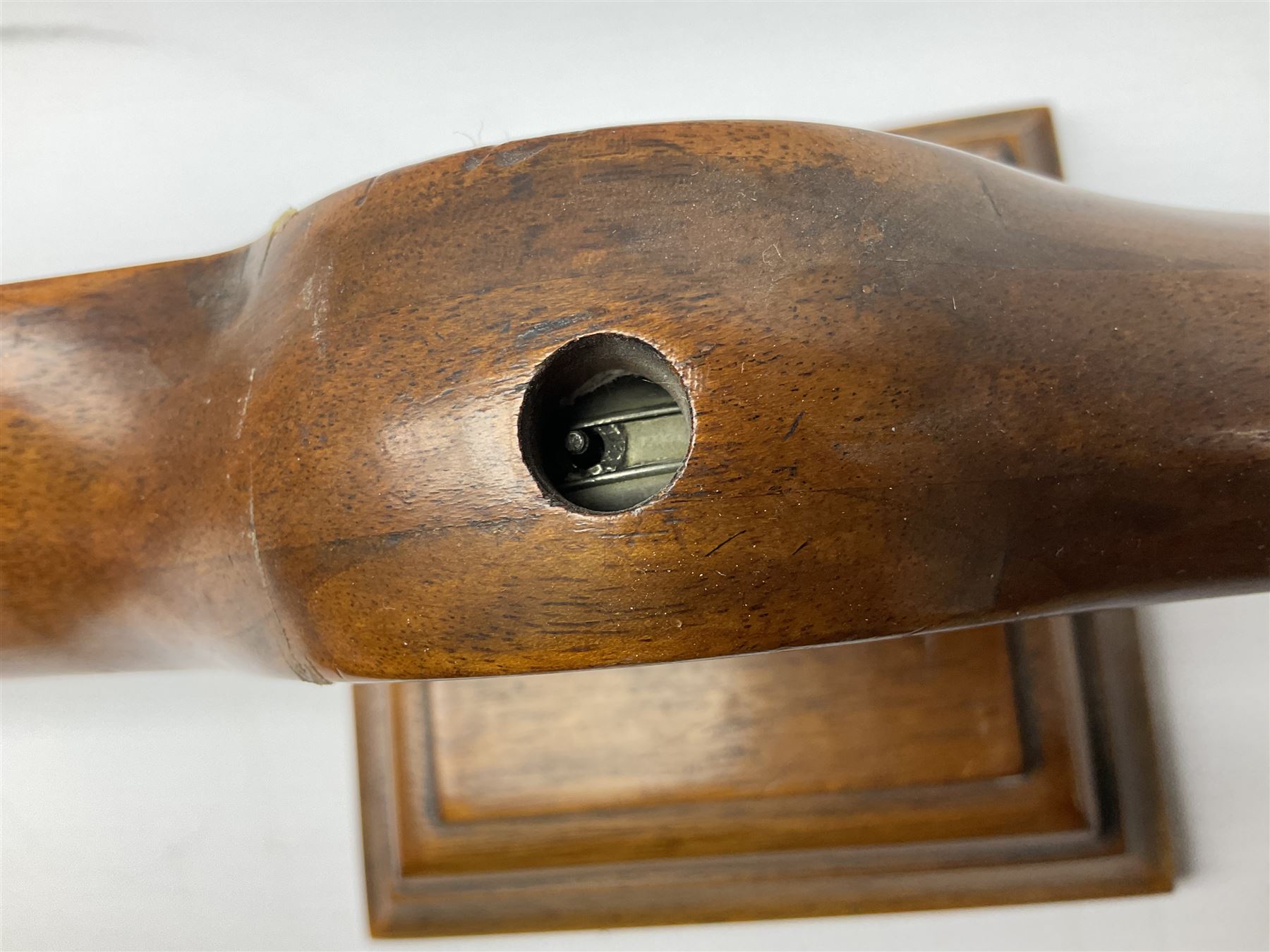 Early 20th century novelty small propeller mantle clock reputedly made by an apprentice at Blackburn Aircraft Works, Beverley & Hull in 1914, the mahogany case loosely inset with a WW1 DOXA Royal Flying Corps pocket watch, the black dial inscribed ' 30-Hour Non-Luminous Mark V.' number BE11653 with subsidiary seconds dial, the back marked with a capital 'A' above a broad arrow, mounted on a stepped square base L67cm