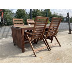 Rectangular teak drop leaf garden table, and four slatted armchairs