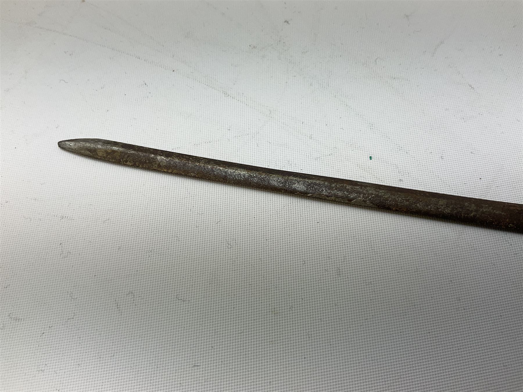 Patinated 'bronze' fantasy dagger, the 26cm blade, hilt and scabbard cast with dragons L50cm overall; hand forged iron spearhead L29.5cm; and a stiletto blade (3)