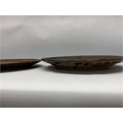 Michael Leach (British 1913-1985) for Yelland pottery; two large glazed stoneware plates with dark brown stylised decoration upon oatmeal ground, together with a jug in merging blue, green and brown, all with impressed marks beneath, largest plate D37cm