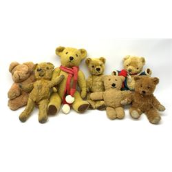 Seven English teddy bears 1950s-60s including Pedigree bear with swivel jointed head, plastic eyes and vertically stitched nose and mouth and jointed limbs with velvet paw pads H15