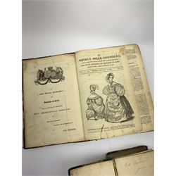 The Ladies' Cabinet of Fashion, Music and Romance. Three volumes. 1840/41/42. Hand coloured fashion plates. Uniformly bound in half morocco; together with The Weekly Belle Assemblee. Bound Literature and Fashion periodical. December - June 1835 (4)