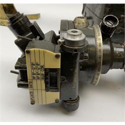 WW2 green painted brass military artillery theodolite, marked 'Director No.7 (Mk.2) OS 1873 GA', dated 1942, serial no.11435, on oak and brass telescopic tripod with green painted metal carrying case; together with five additional unrelated oak and brass telescopic tripod legs