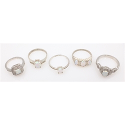  Five opal set silver rings stamped SIL or 925  