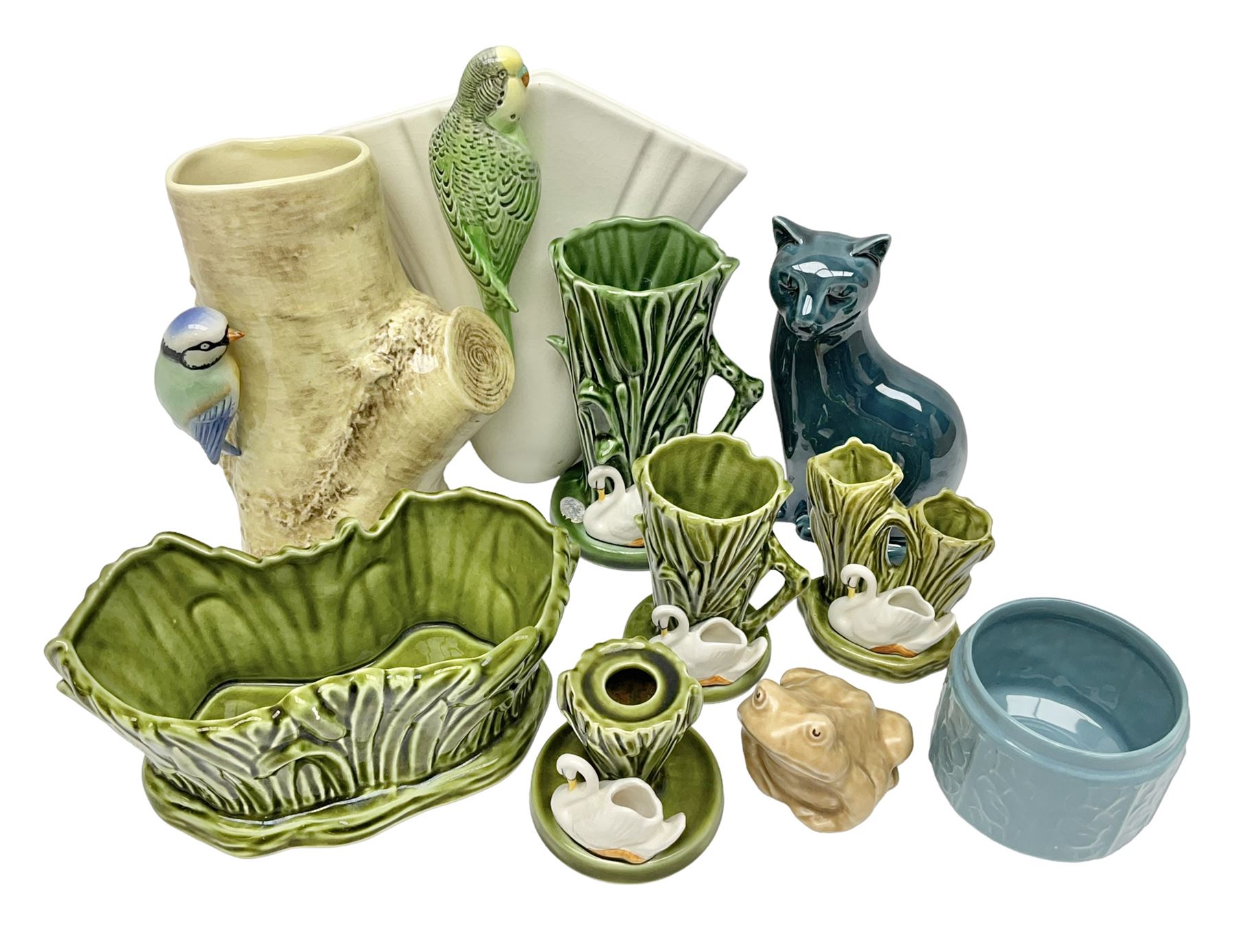 Sylvac budgieregar wall pocket, together with other Sylvac cermics including swan vases, blue tit vase and a frog figure etc, all with printed or impressed marks beneath, and a Poole Pottery cat figure, with printed mark beneath, wall pocket H22cm