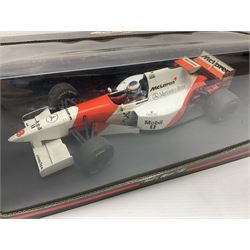 Three Paul's Model Art 1:18 scale die-cast McLaren racing cars - Mercedes MP4/11 D. Coulthard; MP4/4 A. Prost; and Mercedes MP4/10 M. Hakkinen; all boxed (3)