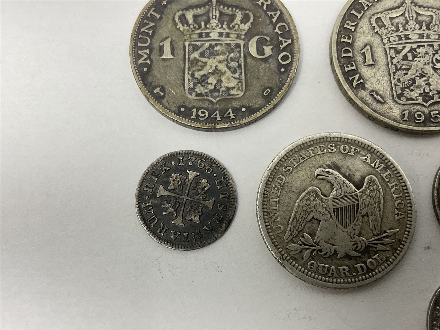 Twelve World coins, including William IIII United Colony of Demerary and Essequibo 1832 one eight guilder, United States of America 1857 quarter dollar, Tunisia 1891 one franc etc 