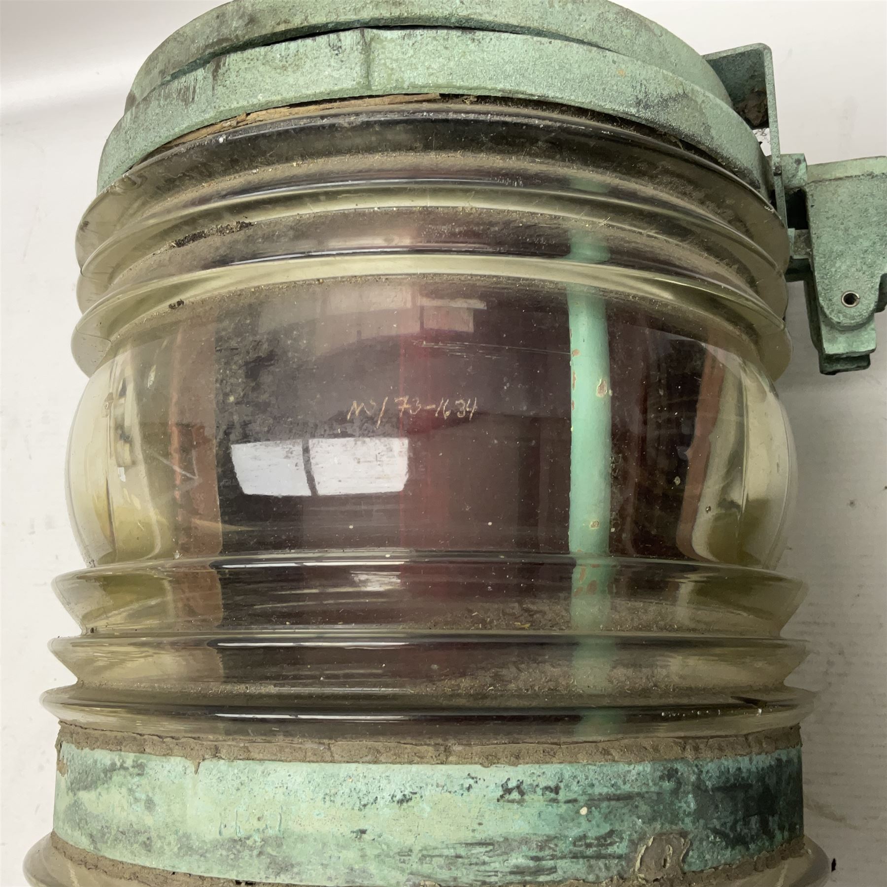 Two port and starboard brass lamps, each with a plaque marked 'Noack as Lanterne KL.A Serie 700 Type 704D Babord', ribbed green and red glass shades, H44cm