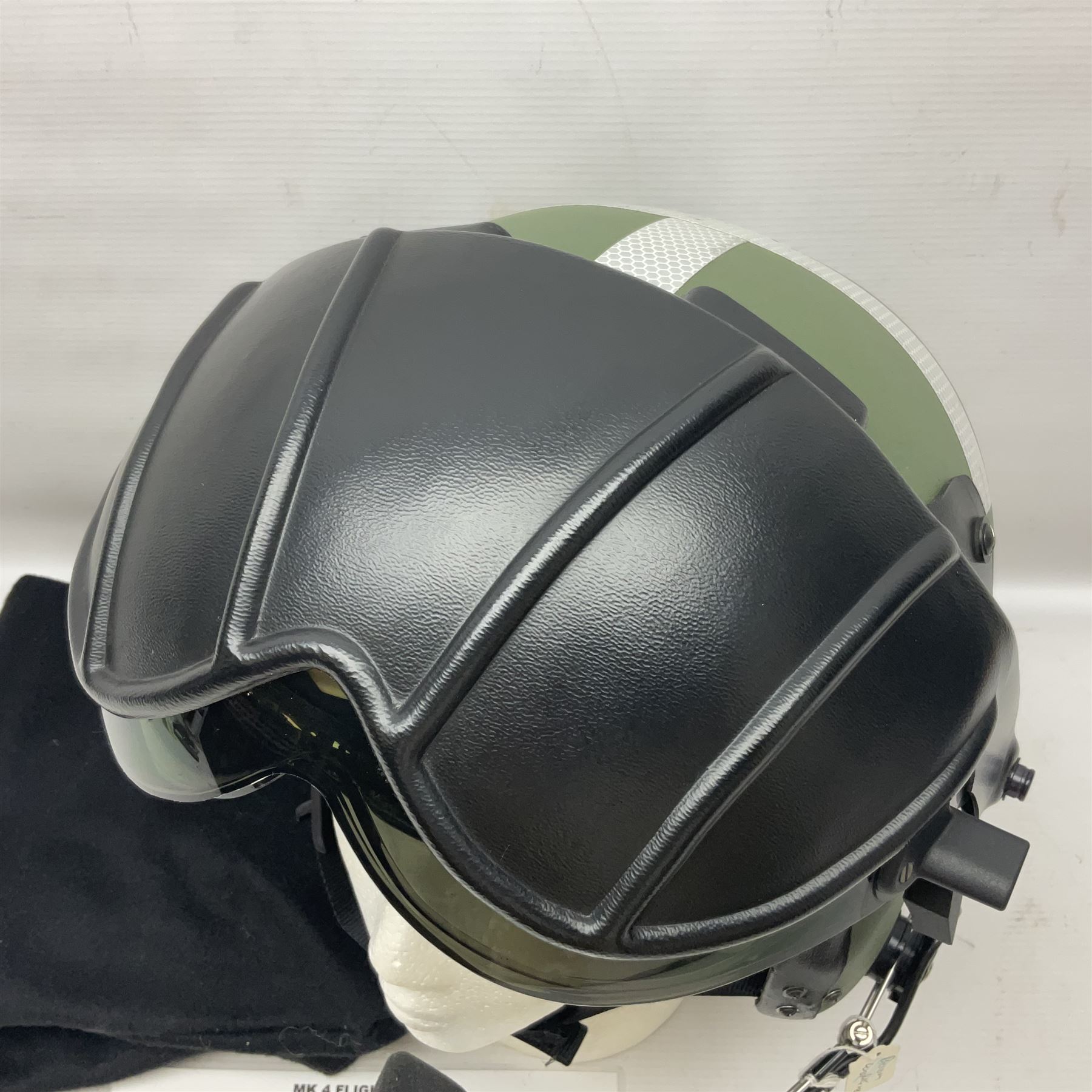 Mk.4 Flight Helmet, as used by RAF and Civilian helicopter pilots; in RAF green,  fitted with rigid visor cover and working boom mike; has had a complete refit and is bench tested.