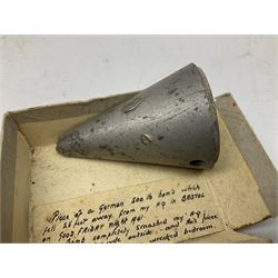 Small collection of WW2 shrapnel and German and British shell parts, most with manuscript details of where and when found including London, Leeds, Bristol, Linton-on-Ouse etc