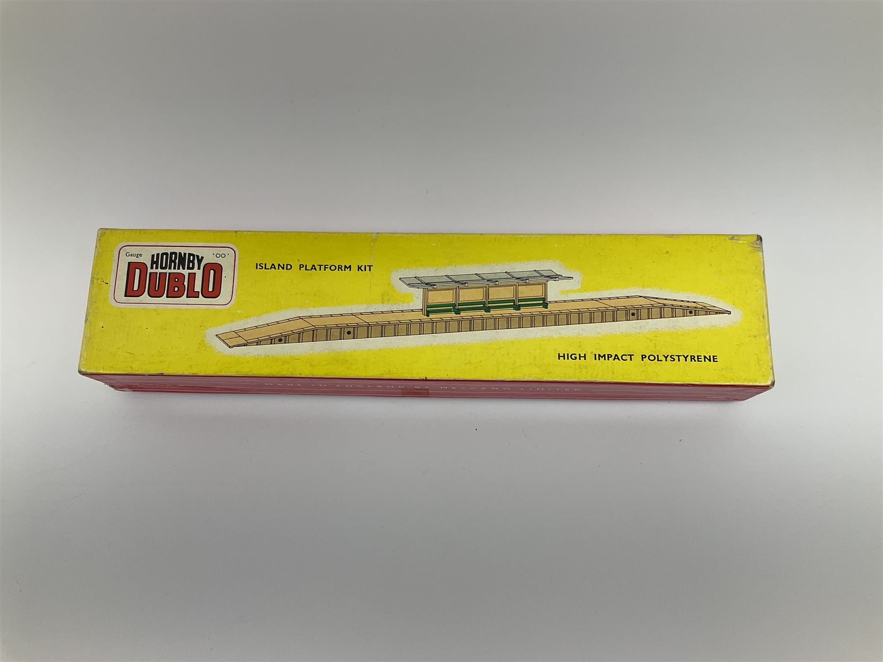 Hornby Dublo - 5006 Engine Shed Extension Kit; 5085 Suburban Station Kit; and 5030 Island Platform Kit; all in pictorial boxes; and Plastic Platform Extension in associated box lid (4)