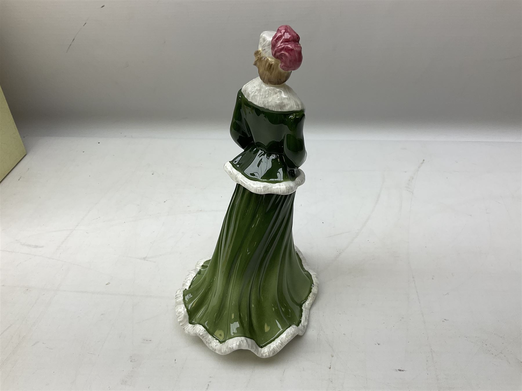 Two limited edition Coalport Sporting Pastimes figures, comprising The Rider and The Skater, both boxed with certificates