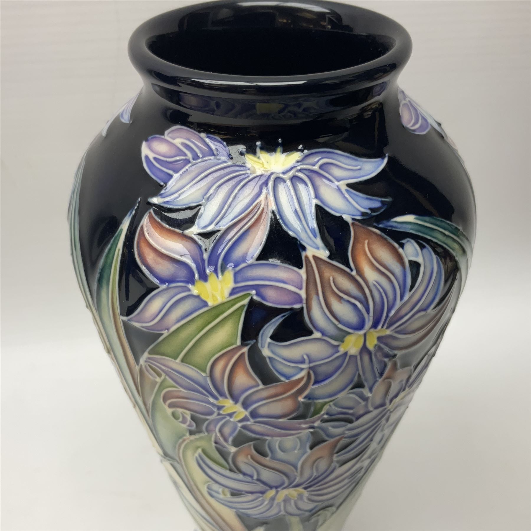 Moorcroft limited edition vase, of tapering form, decorated in the Ostara pattern by Rachel Bishop, circa 2005, no. 69/100, H21cm, with original box