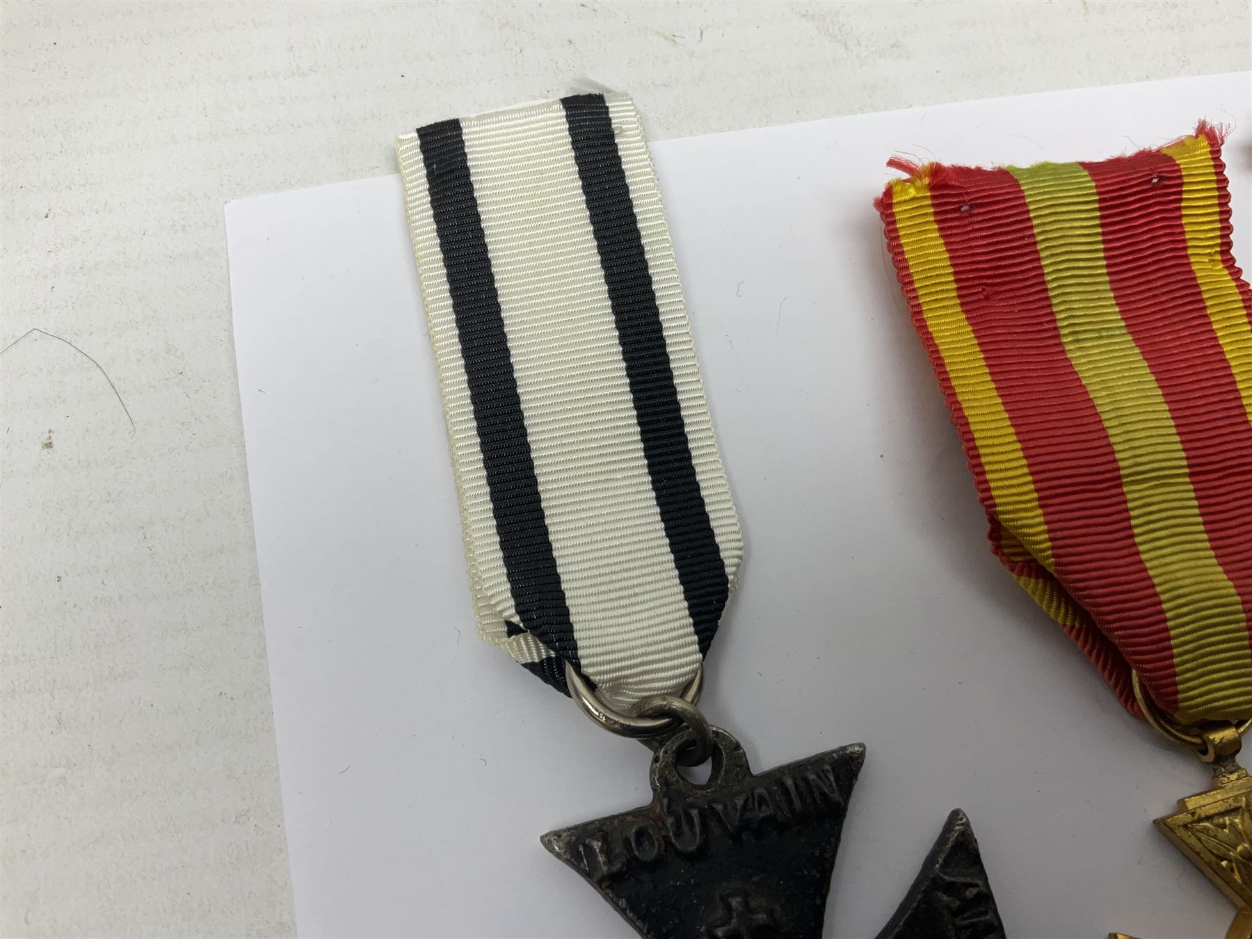 RAOB jewel Bourn Lodge 9394 with 25 years bar; two masonic jewels and triangular pendant watch; British Iron Cross style propaganda medallion; French Legion of Honour and Combatants Cross; and three foreign medals