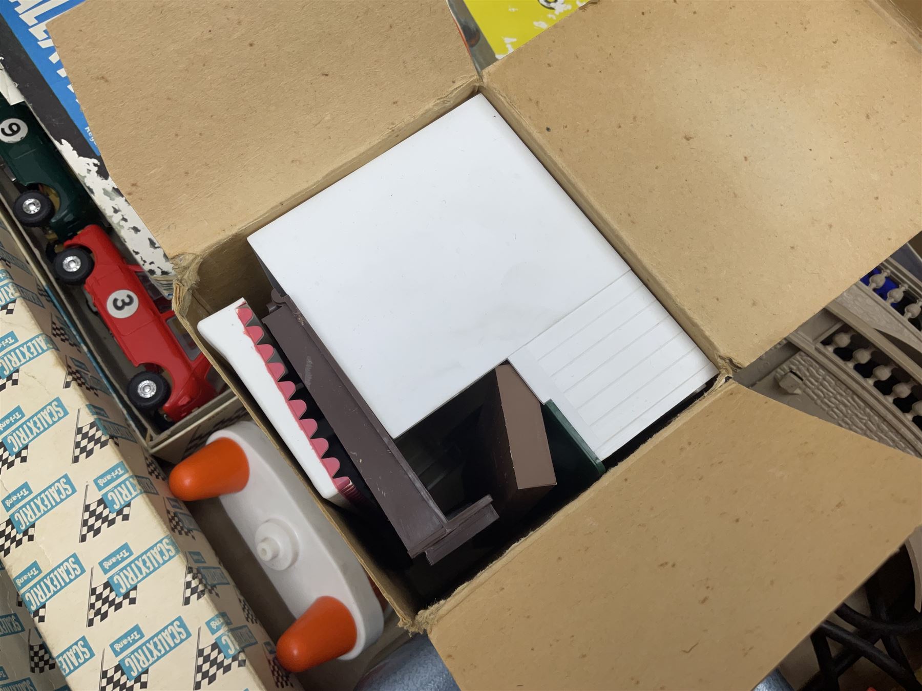 Tri-ang Scalextric - seven cars including pair of Jaguar D Types, pair of Austin Minis, Porsche and BRM racing cars etc; six various controllers and power unit, fencing, banking and bridge pillars, boxed kiosk, quantity of track and paperwork