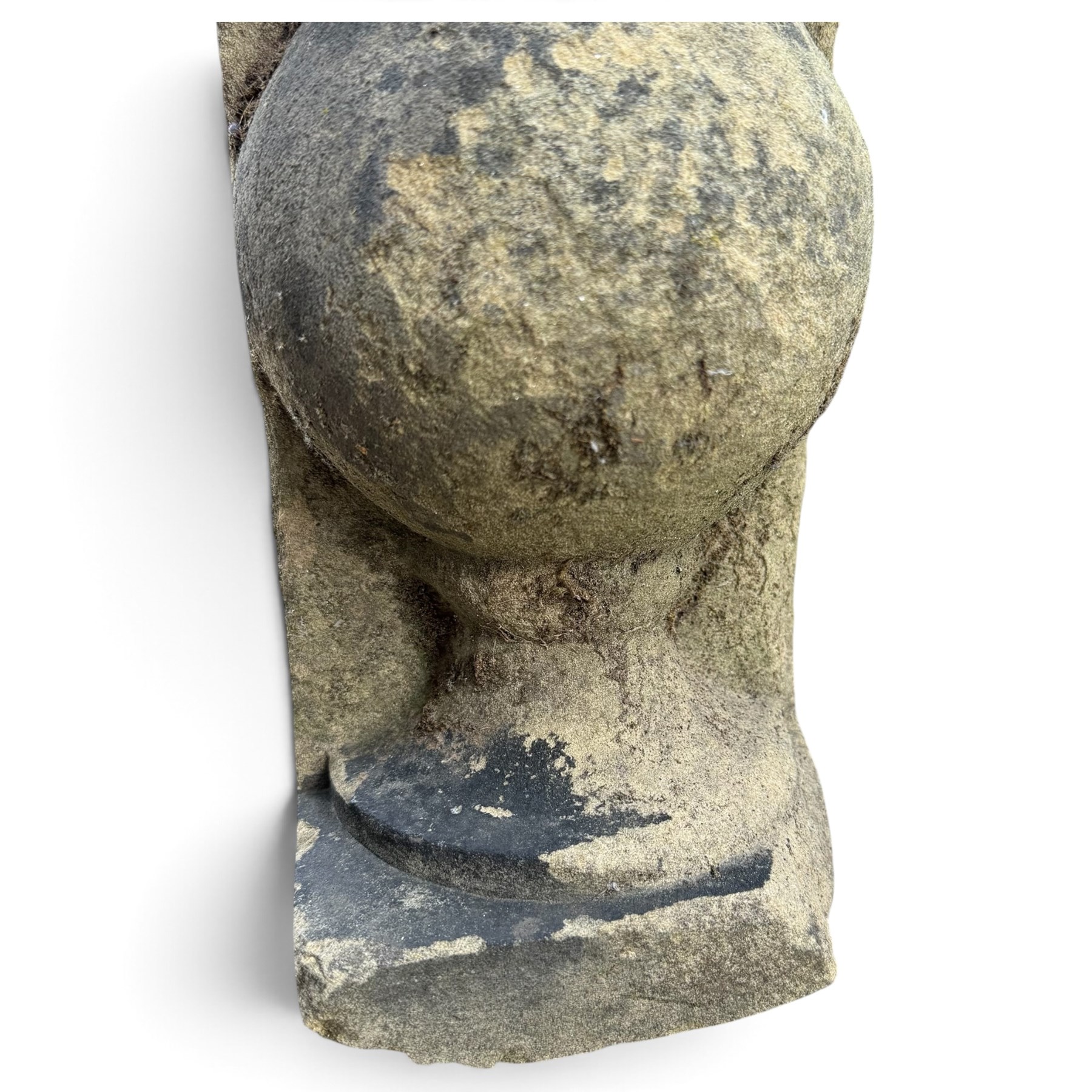 Pair of George III weathered carved sandstone architectural corbels, each with a projecting moulded capital above a half-canted baluster, waisted socle and stepped base