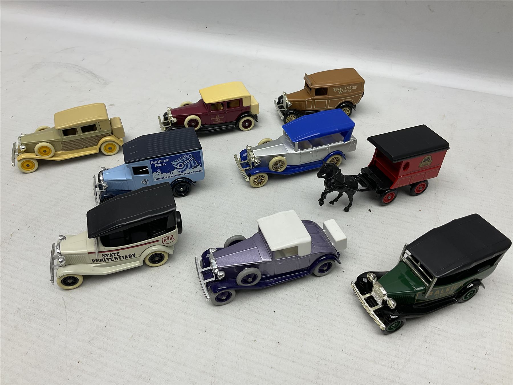 Collection of die-cast vehicles to include Corgi, Dinky, Lledo and Days Gone, housed in six wood display units