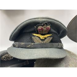 Two air force jackets, together with two helmets and Bamberger Mutzen Industrie German military hat and two others 