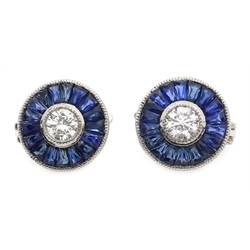  Pair of platinum (tested) round cut diamond and calibre cut sapphire target design earrings  