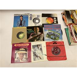 An assortment of Vinyl records.