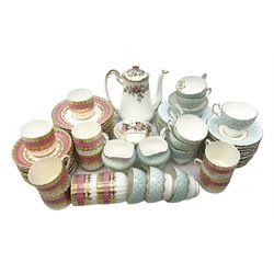 Paragon tea wares decorated with floral sprays within pale blue borders, to include teacups and saucers, together with further pink and gilt tea wares of waved form etc