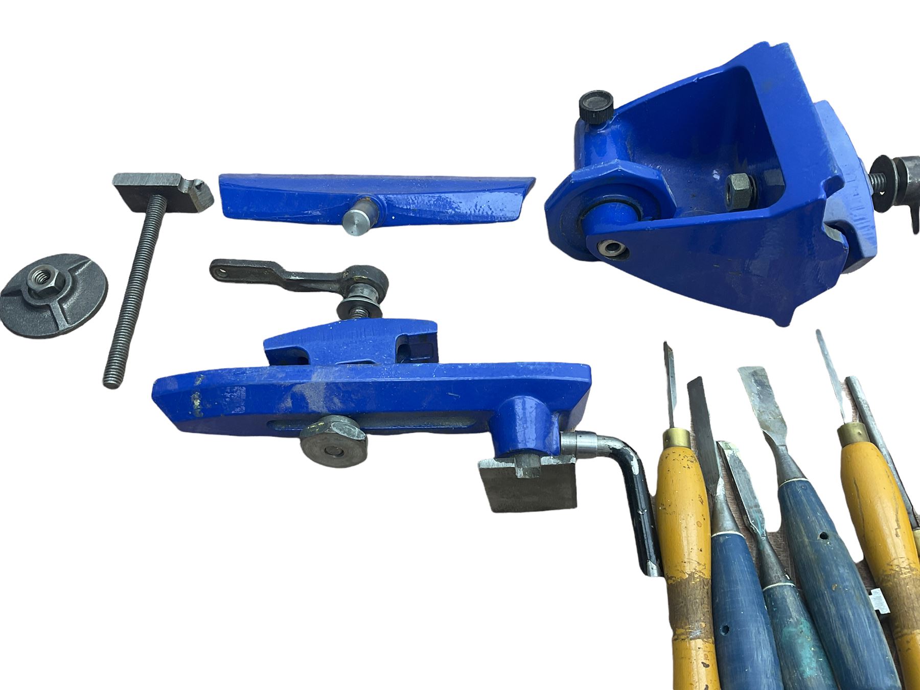 Record wood turning lathe and motor, with a three jaw chuck, tailstock and tool rest, selection of wood turning and woodworking chisels, electric bench grinder with grinding wheel and collet chuck plus a Record bench vice.