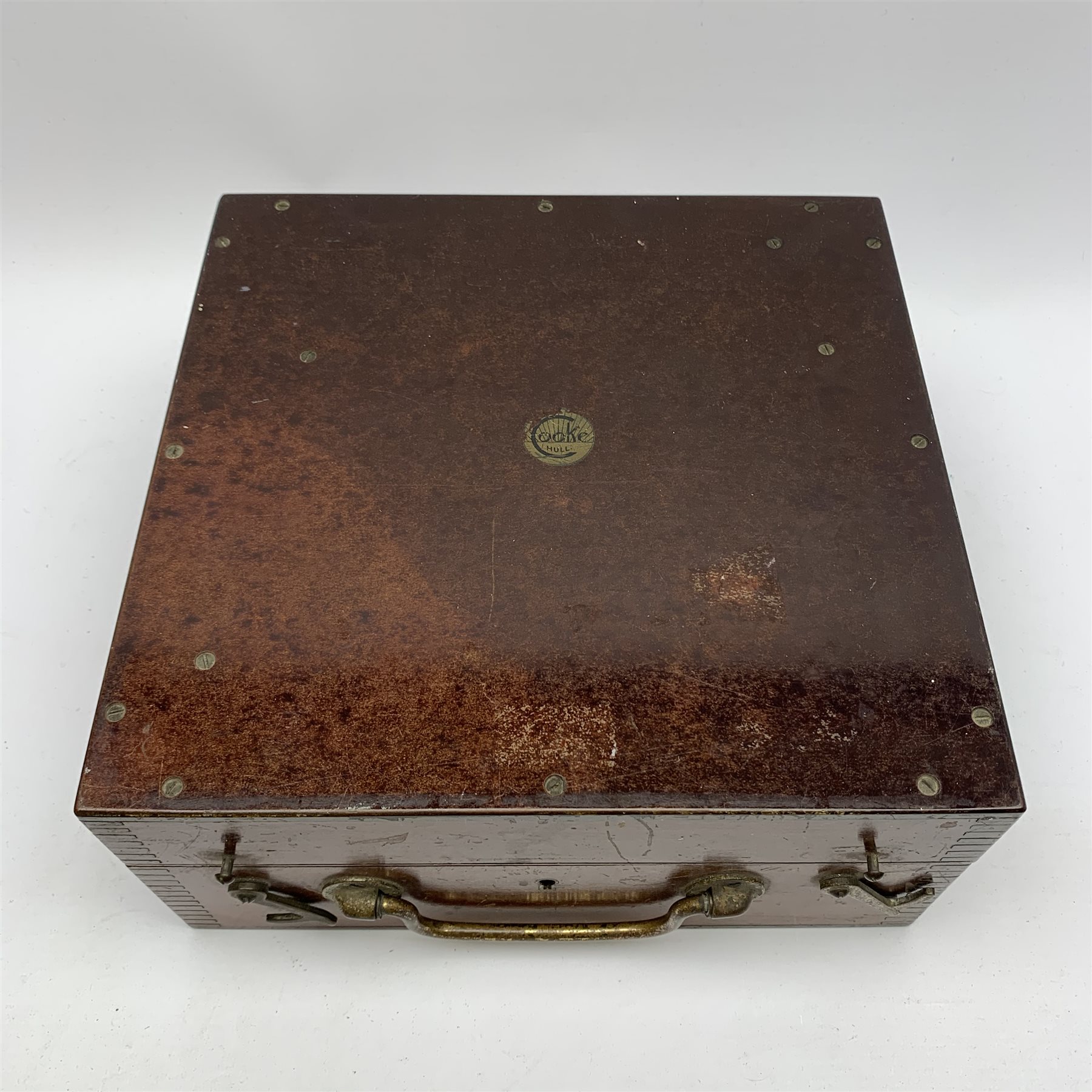 Mid-20th century Heath & Co Hezzanith sextant with black crackled framework and bakolite handle, the brass arc with silvered scale, endless tangent screw and rapid reader, no. P137, in original fitted mahogany box marked Cooke Hull to the paxolin lid, examination certificate dated 1945, various accessories, manuscript biographical note from original owner and other paperwork, box L28cm