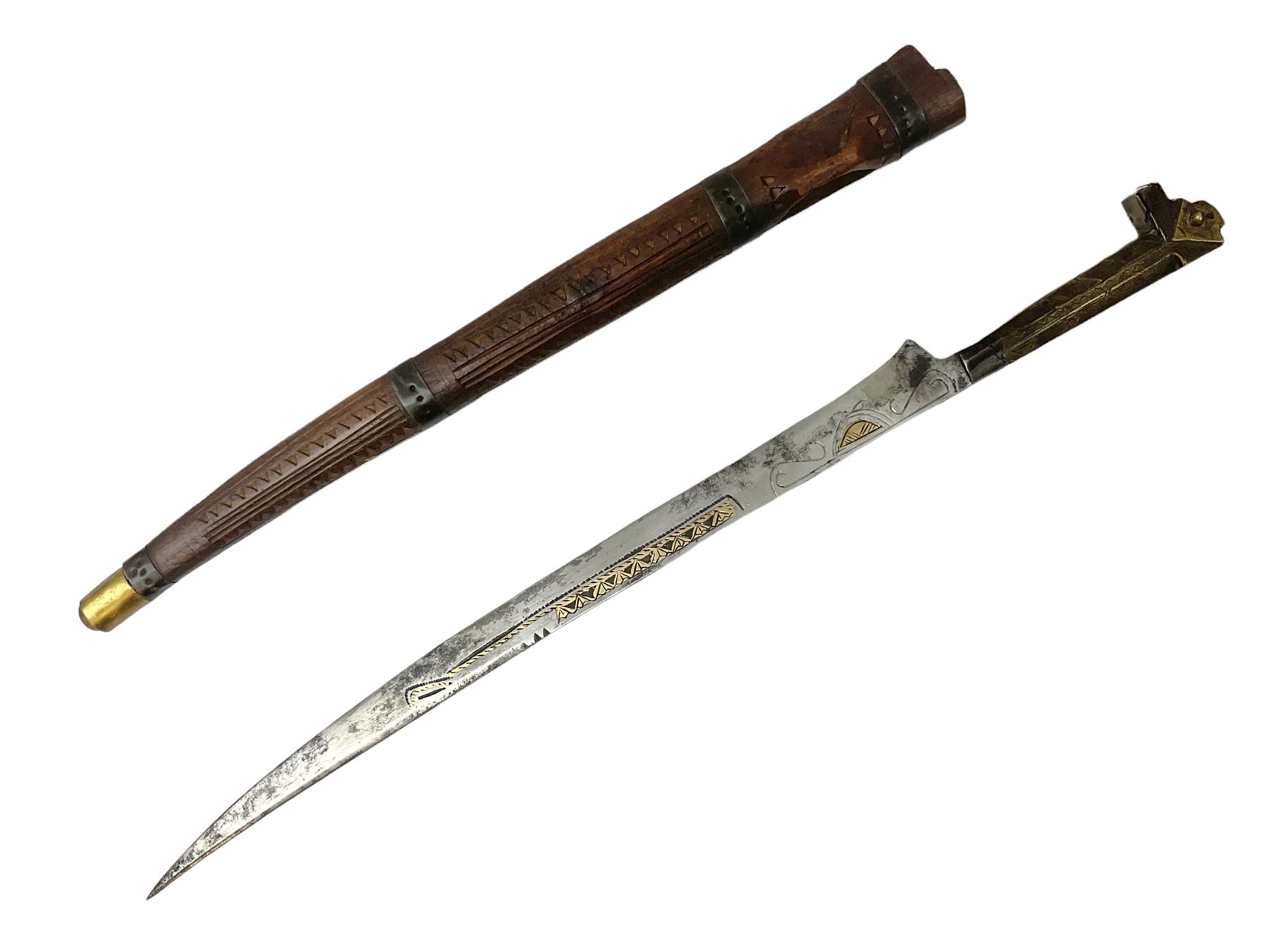 19th century Algerian Flyssa long knife, the 34cm single edged pointed decorative blade inset with yellow metal, chased brass grip with pommel as the snout of a stylised animal and carved hardwood scabbard L45cm overall