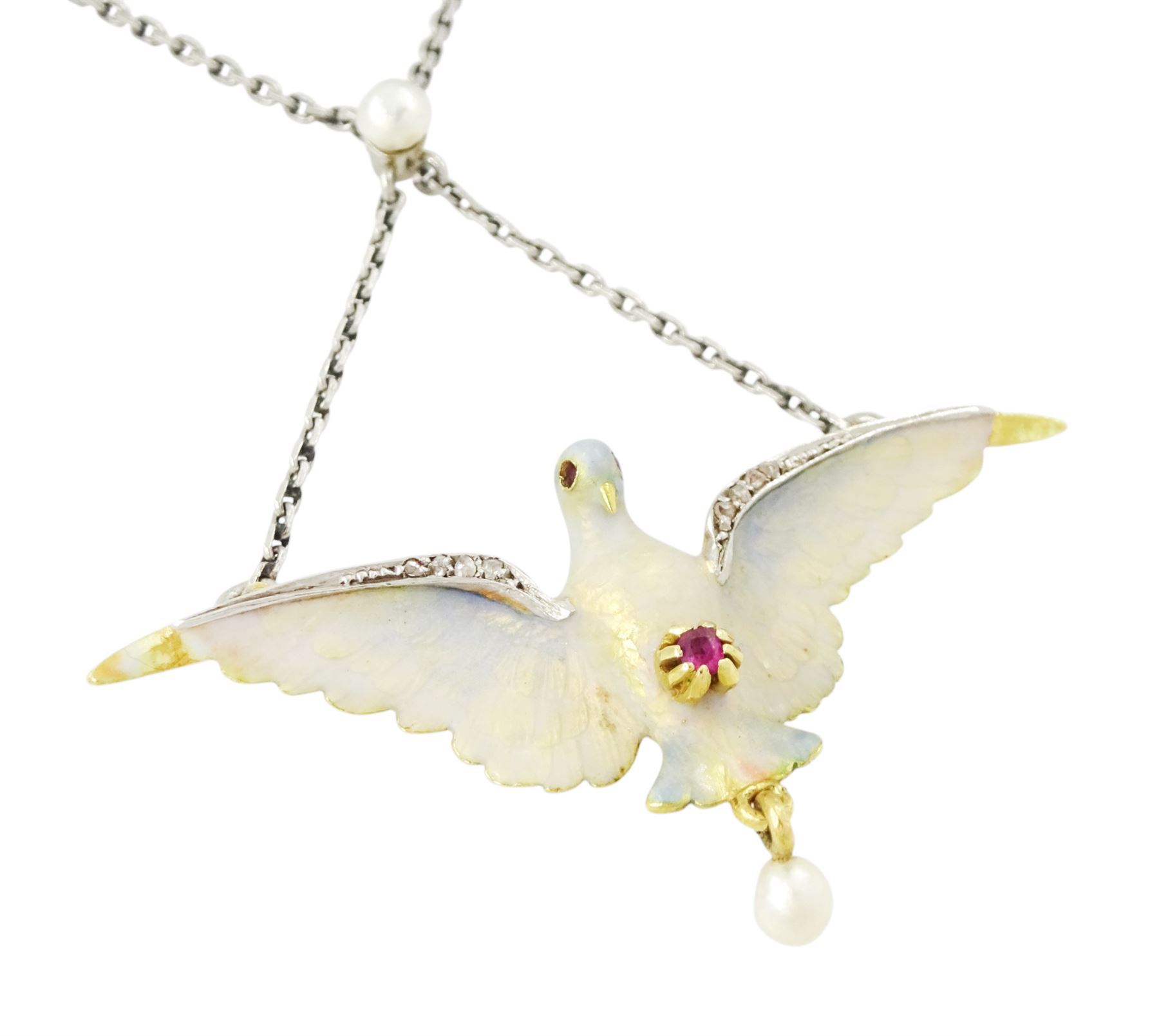 Early 20th century platinum and gold enamel, pearl and diamond dove pendant necklace, the dove in flight, with applied opalescent enamel, ruby set eyes and the wings outlined with rose cut diamonds, its claws holding a round cut ruby and suspending a pearl drop, stamped 18ct, to a platinum chain set with an additional pearl
