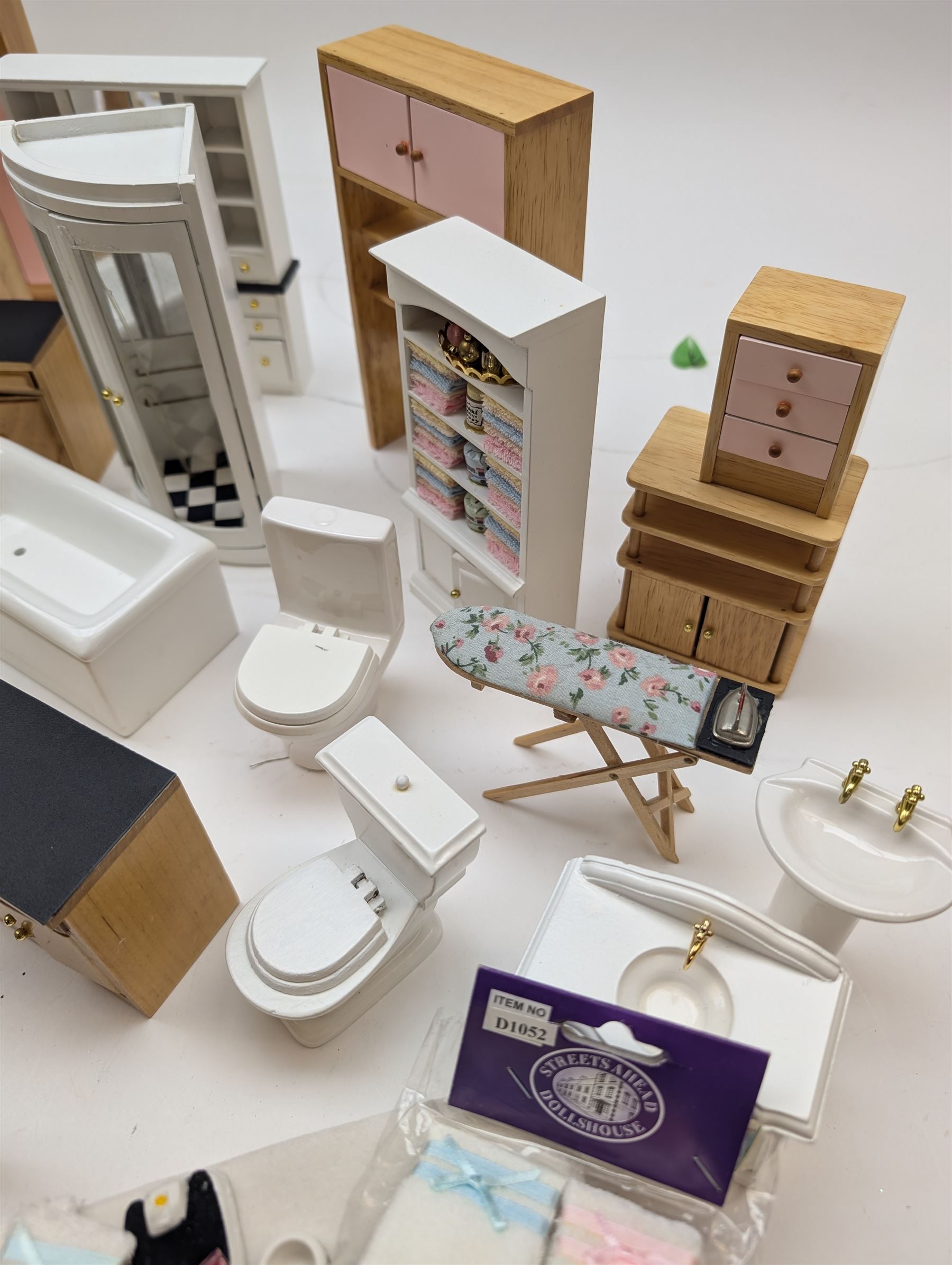 Modern 1:12 scale dolls house furniture, comprising pine kitchen set, with wall cabinets, floor cabinets and sink unit, white wooden bathroom suite, white wooden kitchen and dining room furniture and appliances, wooden bedroom furniture, Raine purple wingback chair, tv, desk, fish tank, etc