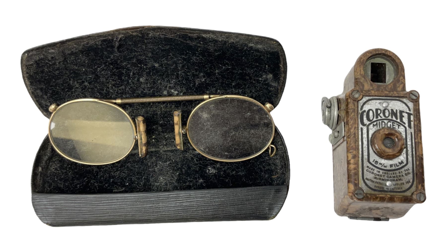20th century Coronet Midget 16mm camera, in marbled brown Bakelite case with chrome mounts, L6cm, together with a pair of 9ct gold (tested) spectacles in case
