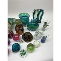 Mdina glass comprising a sculptural glass paperweight, bottle and stopper, vase of teardrop form, two vases and a dish, together with various paperweights including Caithness, vases etc 