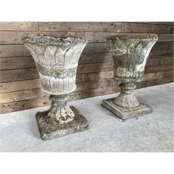 Pair of Regency design weathered cast stone garden urns