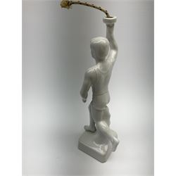 Ceramic Berlin Olympics white glazed figure of a torch bearer, H24.5cm