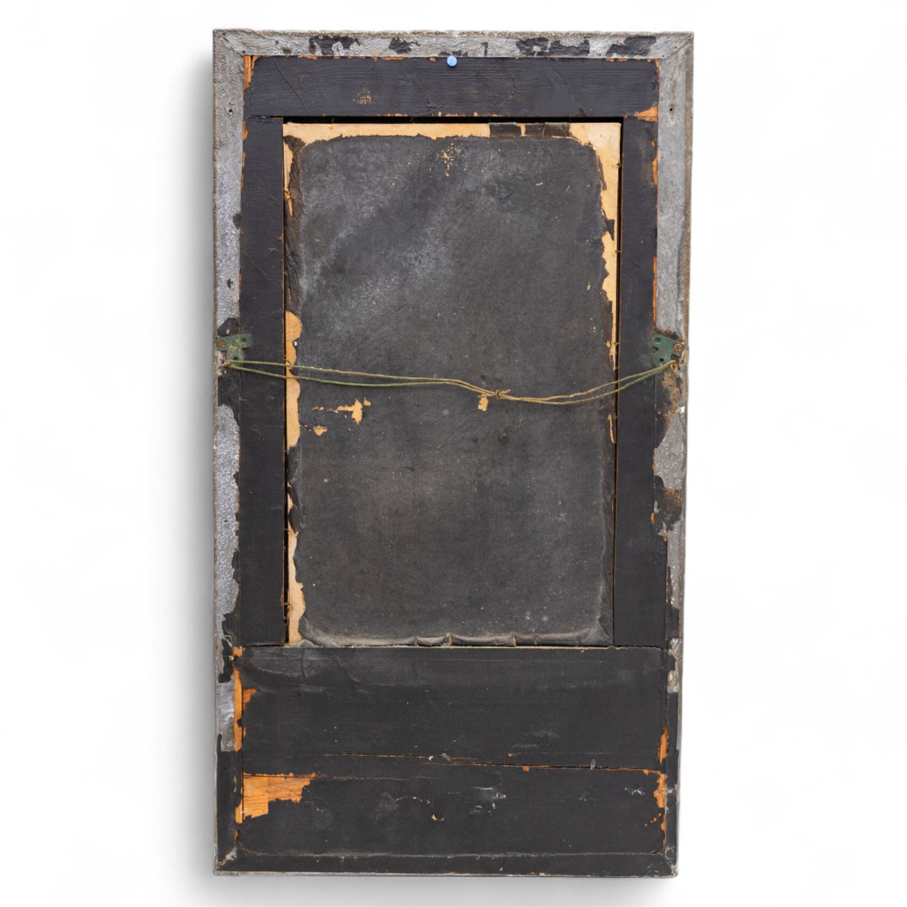 Early 20th-century Arts and Crafts pewter wall mirror, rectangular bevelled mirror plate within a punched pewter frame repoussé decorated with herons among reeds, with a central inset green enamel cabochon panel