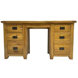 Contemporary oak twin pedestal desk or dressing table, rectangular top, fitted with six graduating drawers, each with metal pull handles and plates