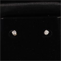 Pair of silver diamond stud earrings, boxed