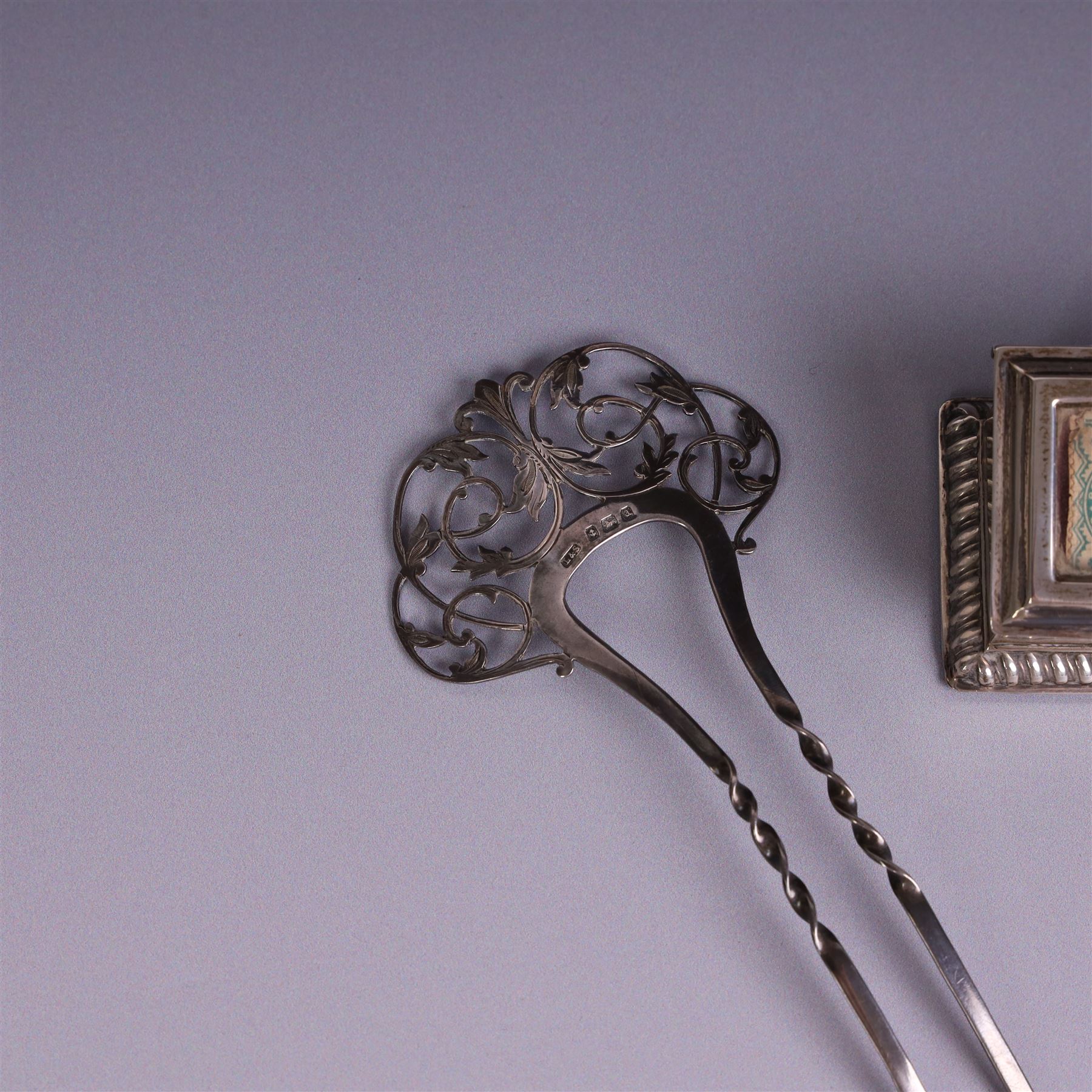 Late Victorian silver mounted stamp box, the hinged lid with three glazed panels, hallmarked Grey & Co, London 1900, together with a late Victorian silver hair comb and a cased set of six silver coffee spoons
