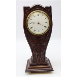  Early 20th century French mahogany mantle clock, carved balloon shaped case, circular roman numeral dial, eight day spring driven movement, H30cm   