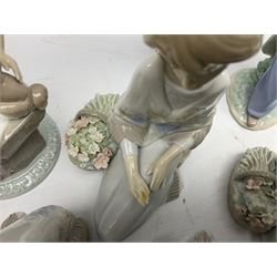 Nine Lladro figures, comprising Pocketful of Wishes no 7650, School Days no 7604, Picture Perfect no 7612 and six Flower Songs no 7607, largest example H27cm