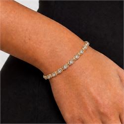 14ct white and yellow gold diamond fancy link bracelet, set with thirty-eight round brilliant cut diamonds, stamped, total diamond weight approx 1.15 carat