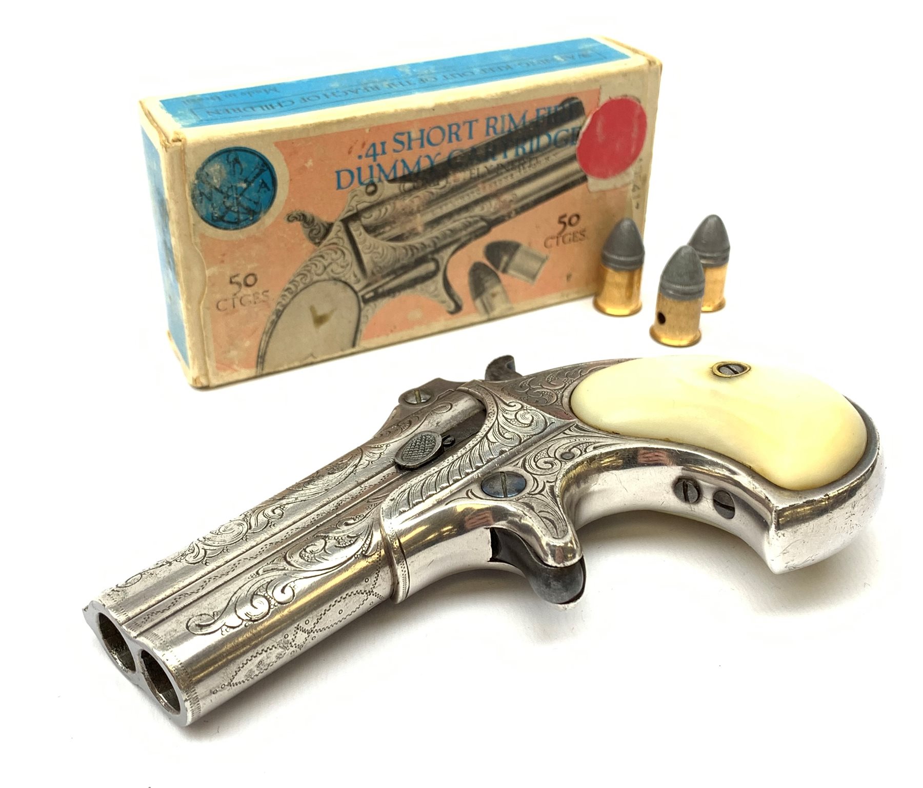 Factory engraved Remington .41 calibre double barrel over and under Derringer, the top of the barrels inscribed 'E. Remington & Sons Ilion. N.Y. Elliot's Patent Dec 12th 1865', with mother-of-pearl split grip, serial no.2695, L13cm overall; with receipt of purchase from Pete Holder dated 08/06/2008; reputedly from the Raymond Kendal collection (former Director of Interpol); with box of  dummy cartridges