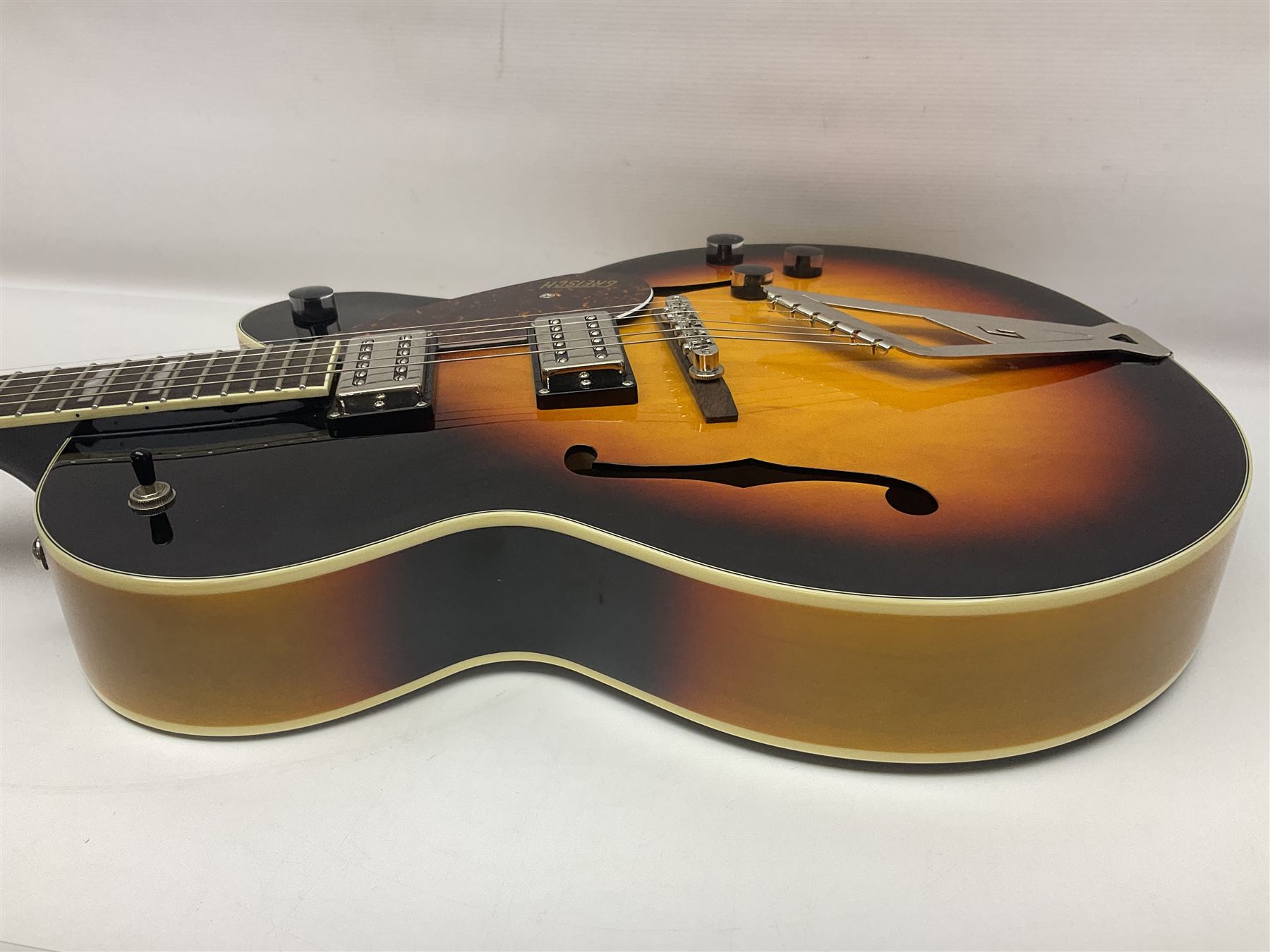 Gretsch G2420/ABB semi-acoustic guitar with three-tone sunburst finish, serial no.IS191201597, L107cm overall; in original hard carrying case dated 2019.
