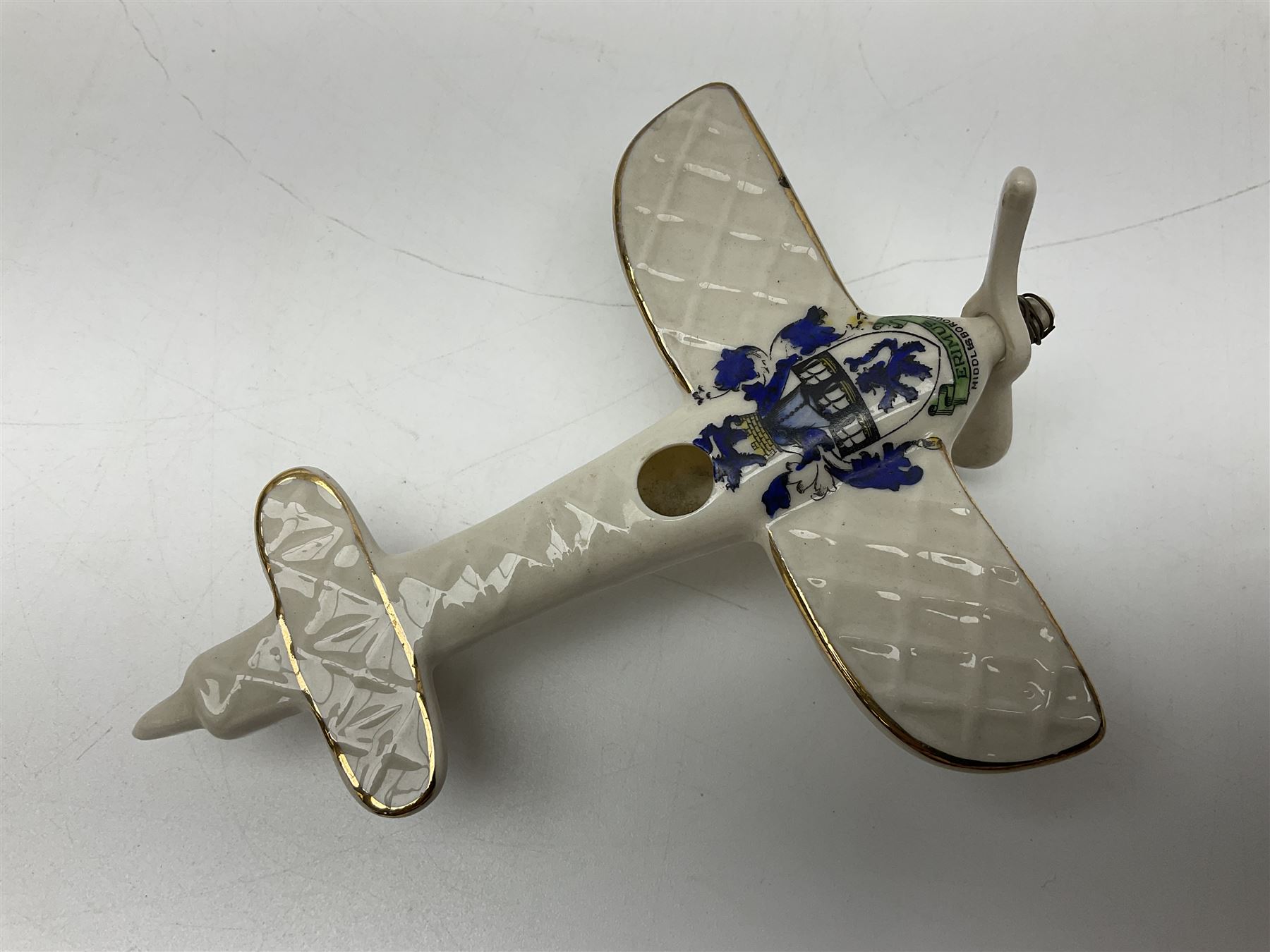 Ten WW1 crested china military models comprising submarine, four ships including Lusitania, four Zeppelins/balloons and an aircraft; various makers including Arcadian China, Swan China, Carlton China, Waterfall, Grafton China etc; various crests including Saint Neots, Great Yarmouth, Tewksbury, Swanage, Simons Town, Hull etc (10)