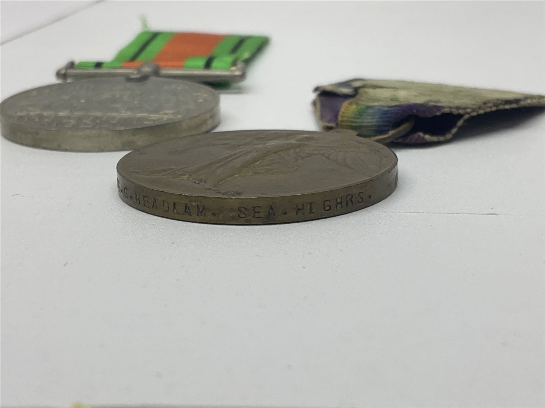 WW1 pair of medals comprising British war medal and Victory Medal awarded to 19774 Pte. G. Headlam Sea. Highrs.; another WW1 pair of medals comprising British War Medal and Mercantile Marine Medal awarded to Charles Filburn; WW2 group of five medals comprising 1939-45 War Medal, Defence Medal, 1939-45 Star, Africa Star and Burma Star; in issue box addressed to Mr. H, Smithson with medal slip; all with ribbons; and Edward VIII Coronation medal (10)