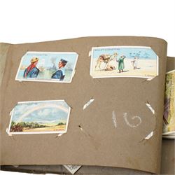 Two cigarette card albums and contents of various cards