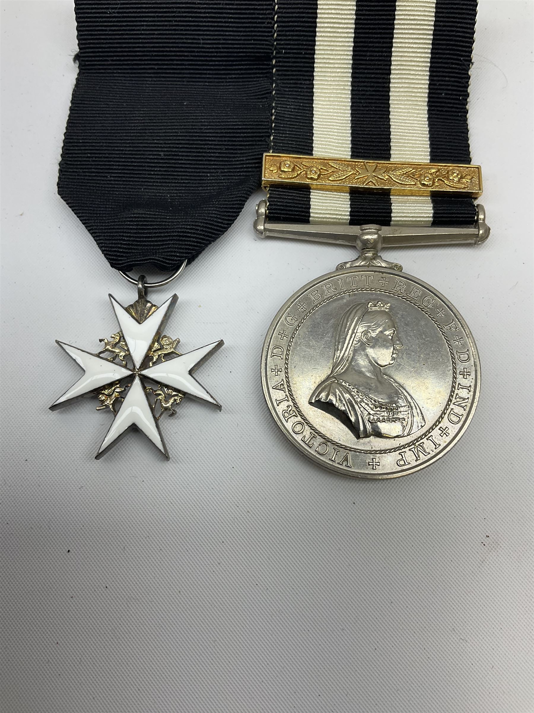 St John's Ambulance Brigade Service medal of the Order of St John and Order of St John enamelled badge
