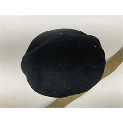 WW2 British black felt beret with Pioneer Corps cap badge, with Kangol Wear maker's mark dated 1943; and a British Army green webbing belt (2)