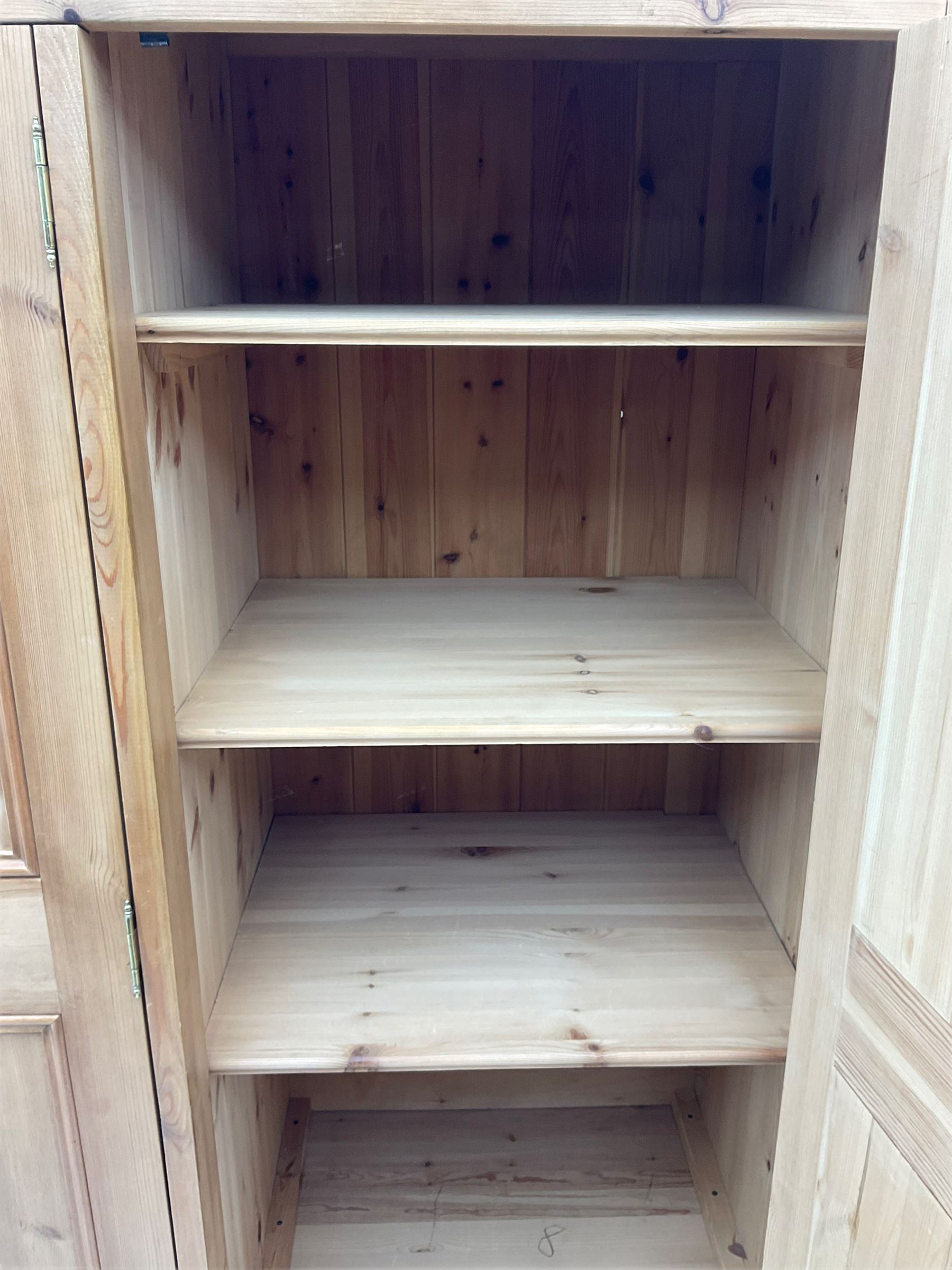 Solid pine triple wardrobe with three drawers