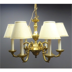  Brass chandelier with carved leaf detailing and six scrolled branches with fabric lampshades  